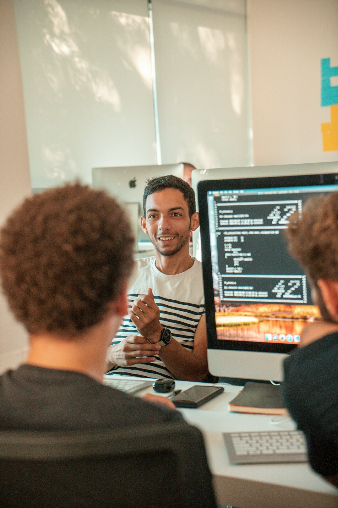 software developers coding together